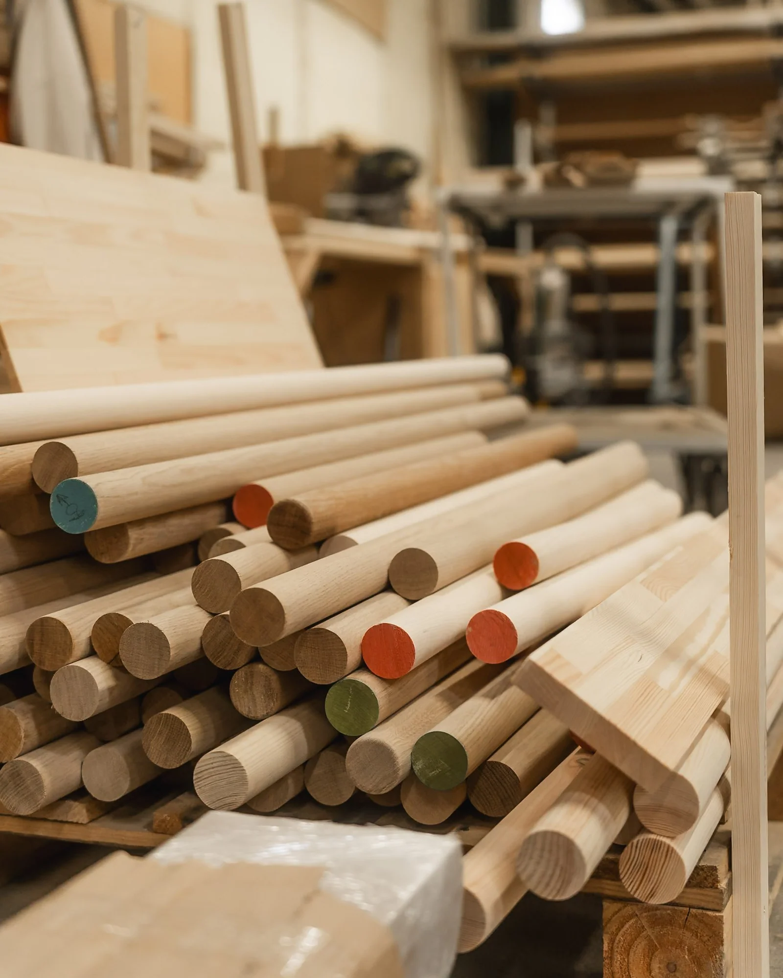 Solid wood handrail blanks and finished handrail sections in our workshop